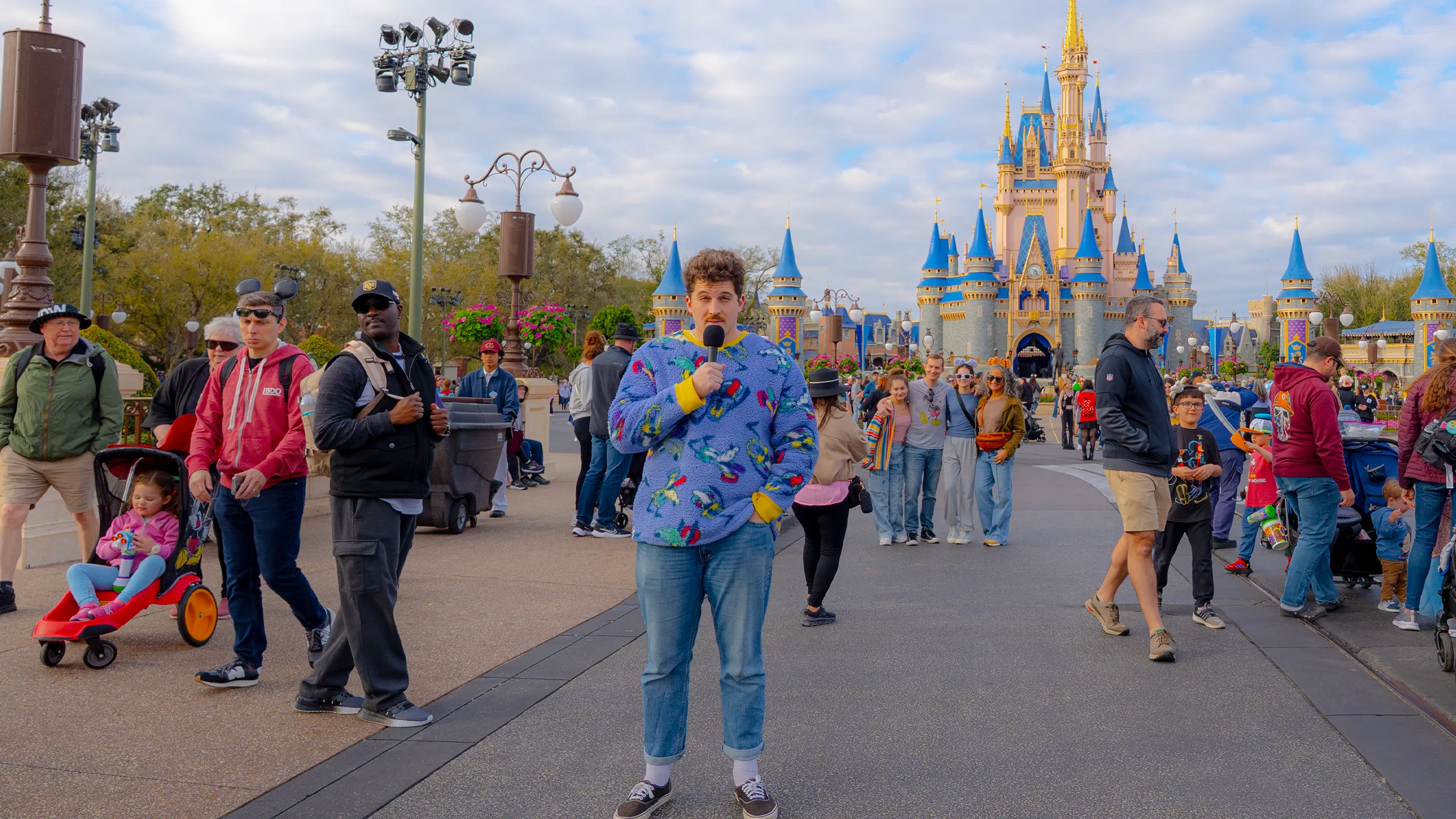 Dino Favara Jr. at Magic Kingdom in front of Cinderella Castle